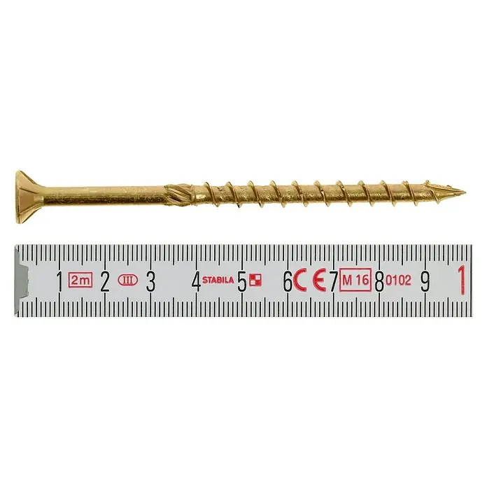 Profi Depot Mehrzweck-Schraube Turbo Drill - Ø x L: 6 x 100 mm, TX für TORX-Antriebe, Senkkopf, 50 Stk. - Nahaufnahme einer goldfarbenen Holzschraube, die neben einem Zentimetermaß liegt, um ihre Länge zu zeigen.
