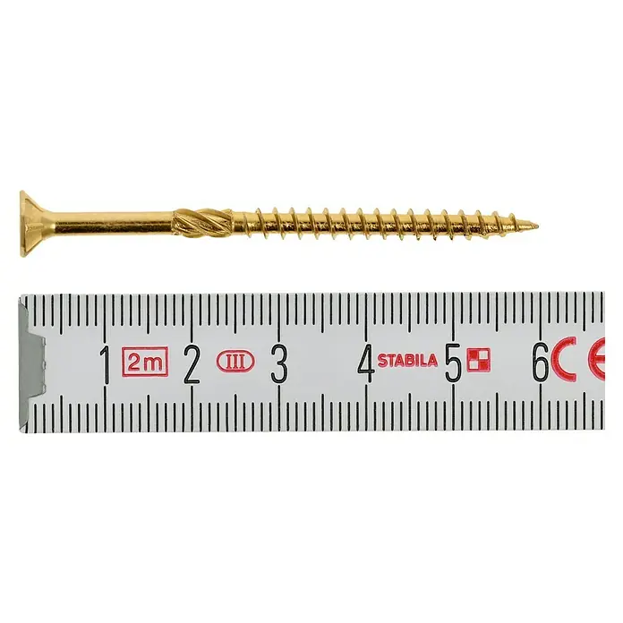 Profi Depot Mehrzweck-Schraube Turbo DrillØ x L: 4 x 60 mm, TX für TORX-Antriebe, Senkkopf, 200 Stk. - Nahaufnahme einer goldenen Holzschraube neben einem Zollstock, der etwa 5,8 cm anzeigt.