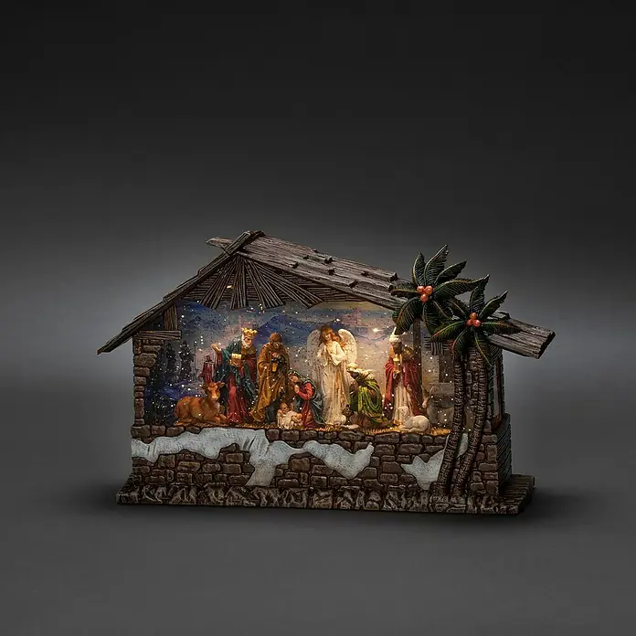 Konstsmide LED-Schneelaterne - Innen, Mehrfarbig, 33,5 x 10,5 x 21 cm, Batteriebetrieben - Weihnachtskrippe mit der Heiligen Familie, den Heiligen Drei Königen, Engeln und einem Stall mit Palmen. Festliche Dekoration für Weihnachten.