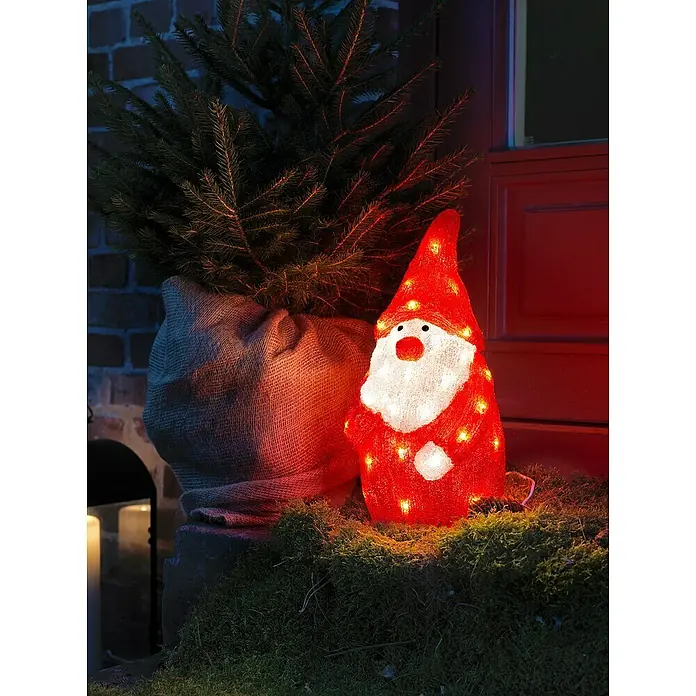 Konstsmide LED-Weihnachtsdekofigur - 18 x 19 x 38 cm, Rot, Weiß, Netzbetrieben, LED - Festliche Gartendekoration mit einem roten Weihnachtswichtel mit Lichtern und einem kleinen Tannenbaum im Jutesack für eine stimmungsvolle Atmosphäre.