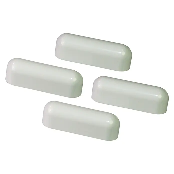 Solid Elements Wasserkappen - 4 Stk., Weiß - Nahaufnahme von vier weißen, länglichen und abgerundeten Kappen, die ordentlich aufgereiht sind und eine saubere und ordentliche Präsentation bieten.