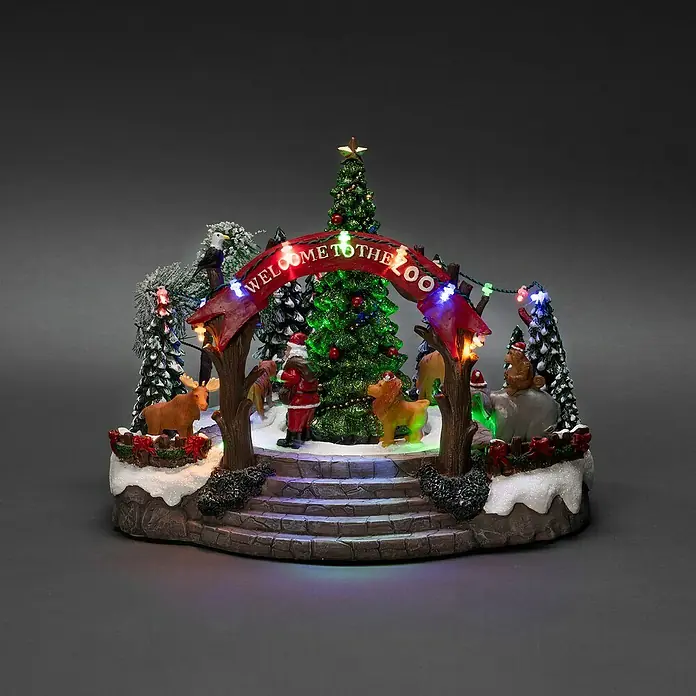 Konstsmide LED-Szenerie Weihnachtszoo - L x B x H: 28 x 22,5 x 20 cm, Netzbetrieben, LED - Weihnachtliche Zoo-Szene mit beleuchtetem Torbogen "Welcome to the Zoo", Tieren und Weihnachtsmann. Festliche Dekoration für die Weihnachtszeit.