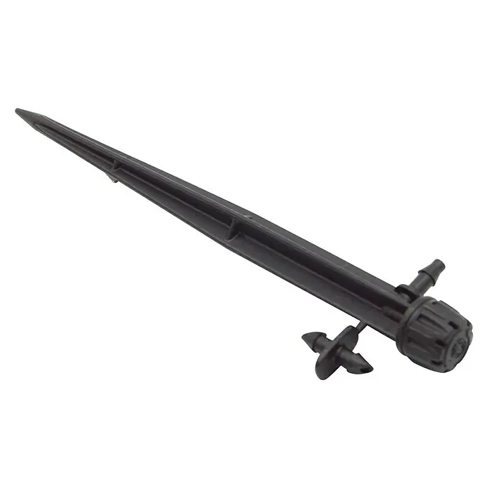 Gotero lineal con regulador y estaca - 25 ud., Caudal de agua máx.: 70 l/h - Primer plano de una estaca de riego negra, utilizada para el riego dirigido de plantas. Ideal para jardines y paisajismo.