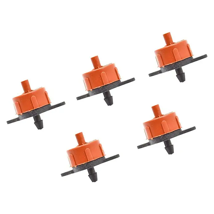 Gotero lineal regulable Autocompensado - 5 ud., Caudal de agua máx.: 4 l/h, Diámetro: 4 mm - Primer plano de goteros de riego, que son de color rojo y negro y están pensados para el riego de jardines.
