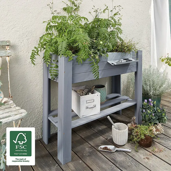 Wagner System GreenFamily Hochbeet GreenBOX light - 83 x 34,5 x 70 cm, Holz, Anthrazit - Grauer Pflanztisch aus Holz mit Pflanzen befüllt, mit Ablageflächen für Gartenzubehör und Werkzeug für den Außenbereich.