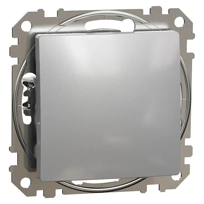 Schneider Electric Sedna Design & Elements Conmutador ciega para mecanismos - Aluminio, Montaje en superficie - Primer plano de un interruptor de luz plateado con cubierta cuadrada y detalles metálicos sobre un fondo negro.