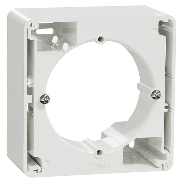 Schneider Electric Sedna Design & Elements Zócalo - 4,3 x 8,3 x 8,4 cm, Blanco - Primer plano de una caja de superficie blanca de Schneider Electric con un hueco redondo, asegurada con dos tornillos.