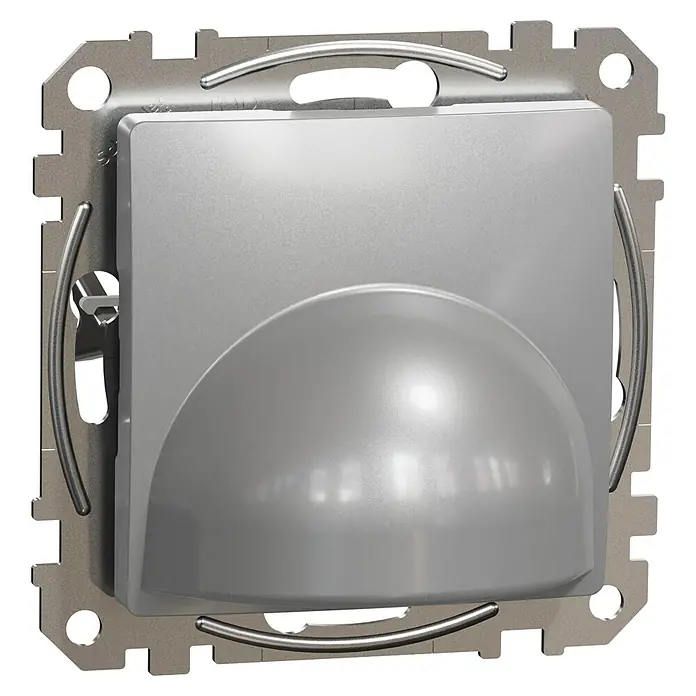 Schneider Electric Sedna Design & Elements Tapa ciega salida de cables - Aluminio, Satinado, Plástico, Montaje en superficie - Primer plano de un detector de movimiento plateado, enmarcado en metal, ideal para aplicaciones de vigilancia interior.
