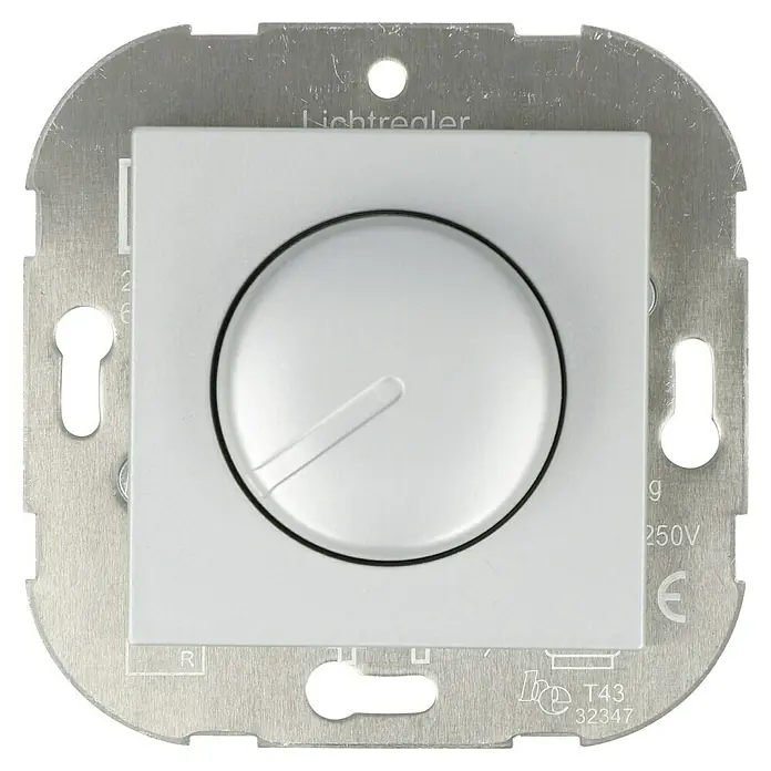 Voltomat ART Dimmer Konventionell - Silber, Kunststoff - Nahaufnahme eines Lichtreglers, ein weißes Bedienelement mit einem Drehknopf zur Steuerung der Lichtintensität, eingebettet in eine Metallfassung.