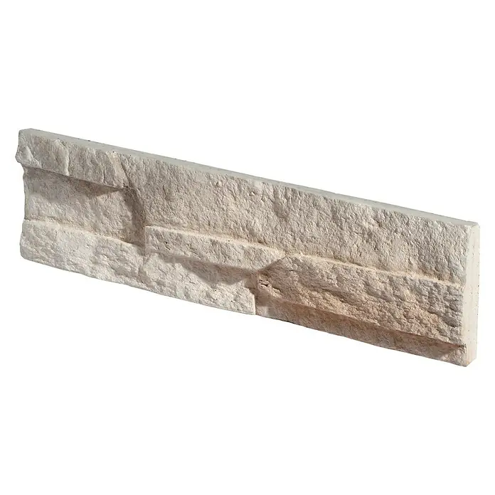 Stegu Verblendstein Laredo - 10 x 38,5 cm, Beige, Steinoptik - Eine einzelne Wandfliese mit Steinmuster. Die Fliese hat eine helle Farbe und eine unebene Oberfläche, die einem Naturstein ähnelt.
