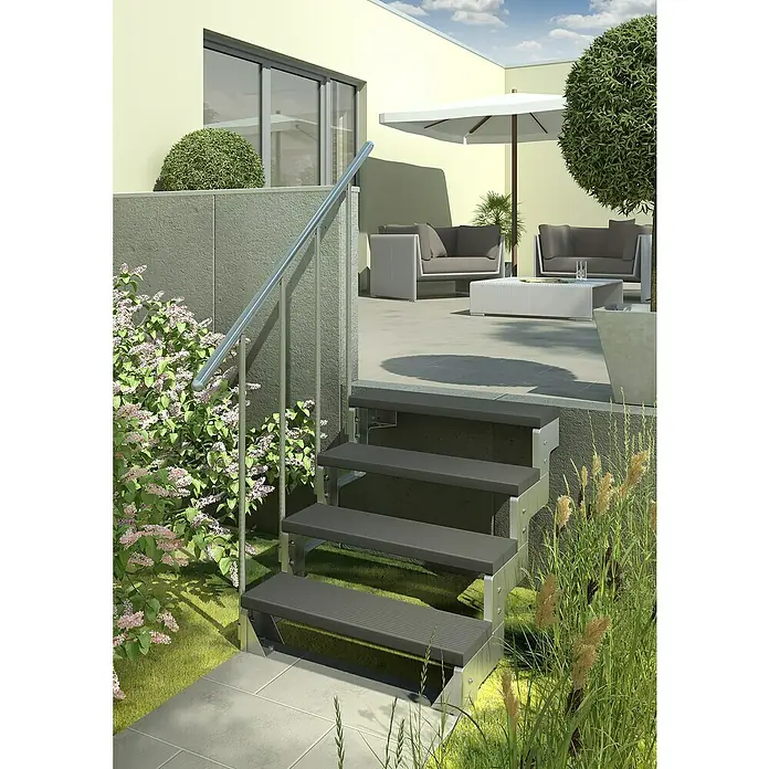 Sogem Escalera exterior Gardentop - Ancho: 80 cm, Número de escalones: 4 ud., Recto, Antracita - Escalera exterior gris con barandilla de metal, enclavada en un jardín con arbustos en flor y césped ornamental, ofreciendo una transición elegante.