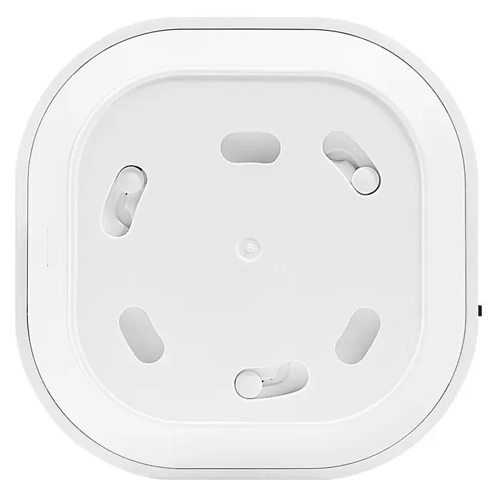 Ledvance Smart+ WiFi Bewegungsmelder - Weiß, L x B x H: 6,03 x 2,05 x 6,03 cm - Nahaufnahme einer weißen, quadratischen Deckenplatte mit Aussparungen und Befestigungspunkten für die Installation.