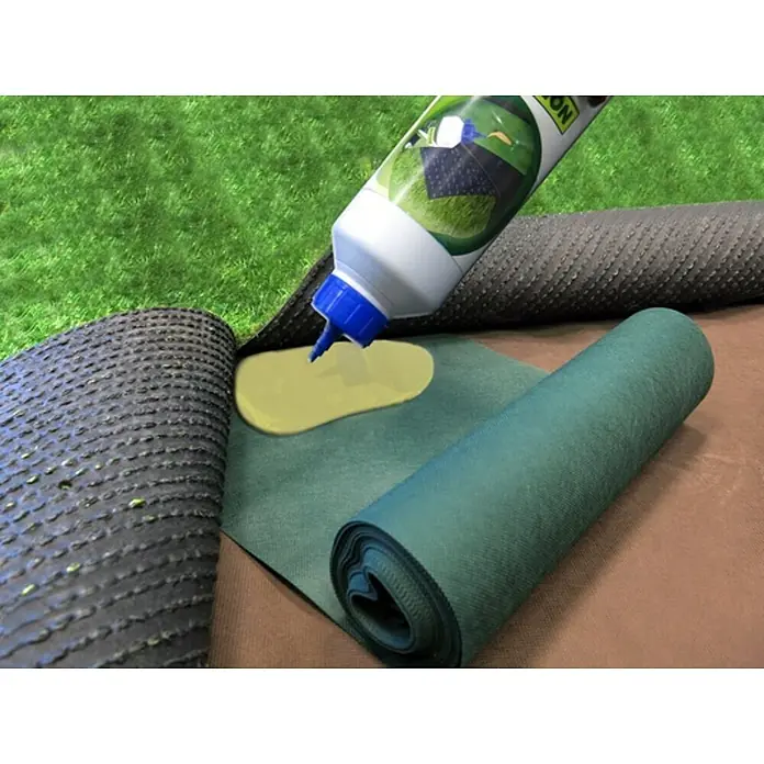 Correa de amarre unión de césped - 30 cm x 10 m, Plástico - Primer plano de pegamento para césped artificial que se aplica al césped sintético, asegurando una unión duradera.