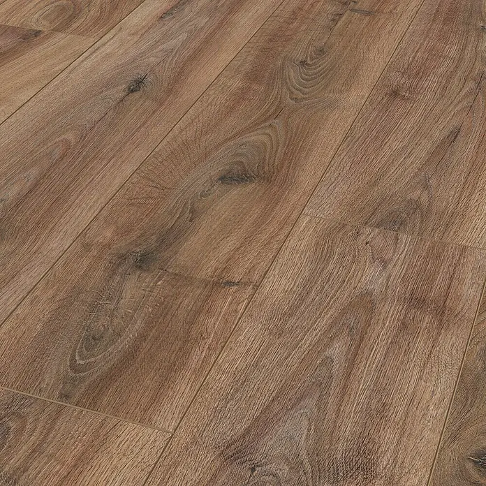 LOGOCLIC Aquaprotect Laminado Roble Renaissance - 1.285 x 192 x 12 mm, Roble, AC5, Resistente al agua - Una vista detallada de un suelo laminado en tonos marrones cálidos, que muestra un aspecto de madera natural y patrones de vetas prominentes.