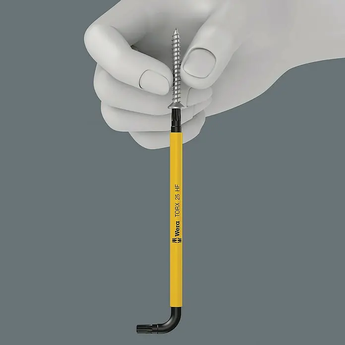 Wera Winkelschlüssel-Set Bicycle Set 4 - 9 -tlg. - Ein Wera TORX 25 HF Winkelschraubendreher mit gelbem Griff hält eine Schraube in einer weißen Hand.