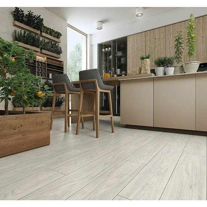 LOGOCLIC Laminado Nogal Sintra - 1.380 x 193 x 8 mm, AC5 - Esta toma destaca un espacio luminoso, centrándose en el piso de madera clara que se extiende por toda la habitación.