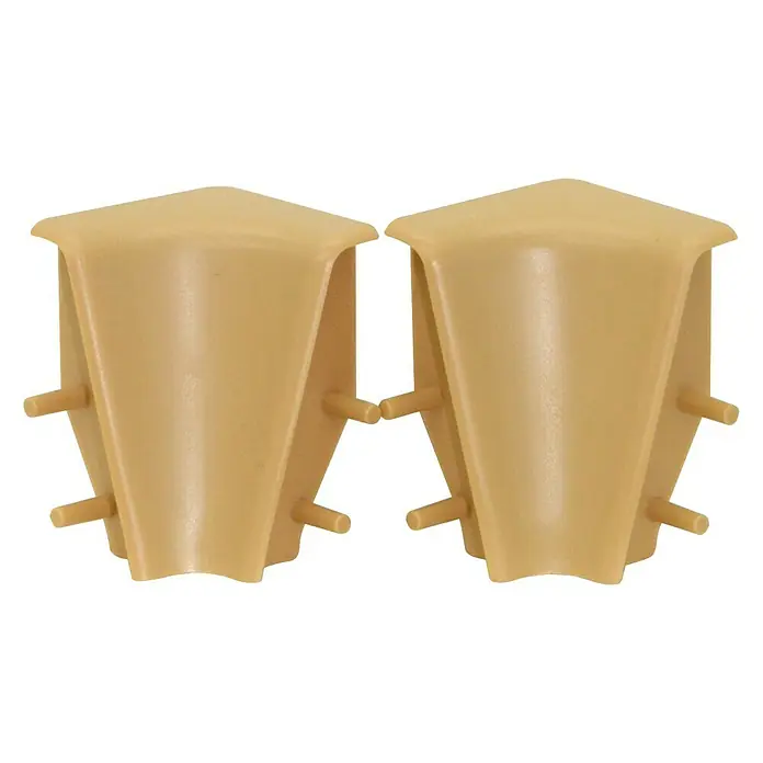 Profiles and more Innenecke FU147H - Eiche Hell, 2 Stk. - Zwei beigefarbene Eckverbinder aus Kunststoff mit Stiften zur Befestigung an Möbeln oder anderen Gegenständen.