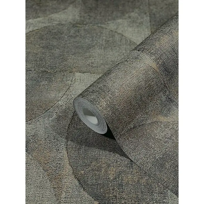 Marburg Vintage Deluxe Vliestapete - Grau-Anthrazit, Grafisch, 10,05 x 0,53 m - Nahaufnahme einer Rolle gemusterter Tapete in Grau- und Goldtönen. Das abstrakte Design besteht aus sich überlappenden Kreisen und Texturen.