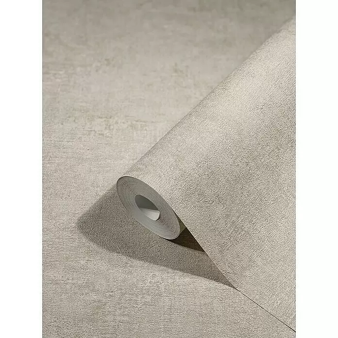 Marburg Vintage Deluxe Vliestapete - Beige, Uni, 10,05 x 0,53 m - Strukturiertes hellbeiges Tapetenrolle, teilweise abgerollt, zeigt dezentes Used-Muster und raue Oberfläche.