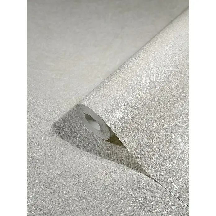 Marburg Vintage Deluxe Vliestapete - Greige-Pearl, Uni, 10,05 x 0,53 m - Nahaufnahme einer Rolle grauer, strukturierter Tapete. Das abstrakte Muster und die dezente Farbgebung machen sie zu einer stilvollen Wandgestaltung.