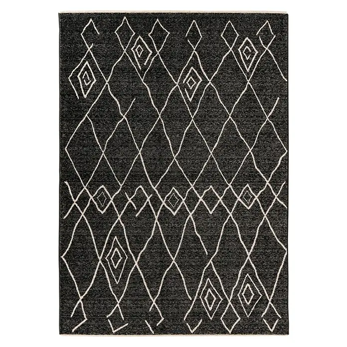 Kurzflorteppich Agadir - Graphit, 150 x 80 cm, 100% Polypropylen (Flor) - Dieser rechteckige Teppich zeigt ein abstraktes Rautenmuster in Weiß auf einem dunklen, strukturierten Hintergrund. Ein modernes Dekoelement.