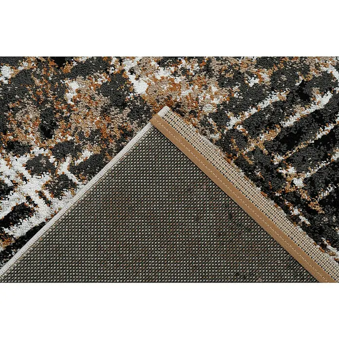 Kurzflorteppich Louvre - Terra, 150 x 80 cm, 100% Polypropylen (Flor) - Nahaufnahme eines Teppichs mit abstraktem Muster in Grau-, Braun- und Weißtönen, der die Textur und die Detailgenauigkeit des Produkts hervorhebt.