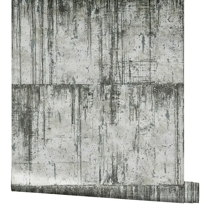 Marburg Natural Opulence Vliestapete - Schwarz-Weiß, Betonoptik, 10,05 x 0,7 m - Detailaufnahme einer Betonstruktur mit vertikalen Schlieren und unregelmäßiger Oberfläche, die eine industrielle Ästhetik erzeugt.