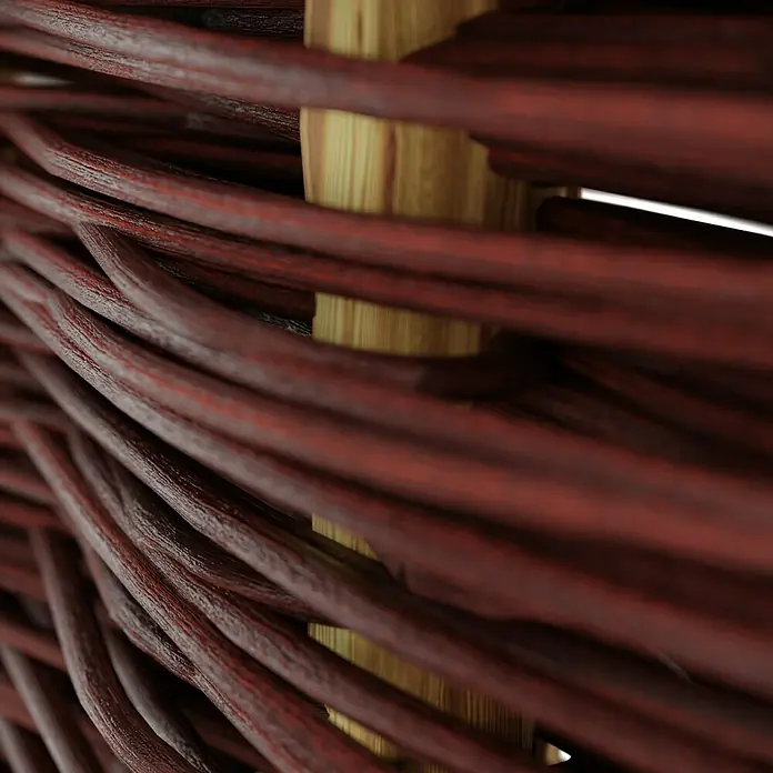 T & J Sichtschutzelement Aso - 180 x 90 cm, Braun - Detailaufnahme eines Korbstuhls mit roten Rattanfasern, die um helles Holz gewoben sind und eine warme, rustikale Atmosphäre erzeugen.