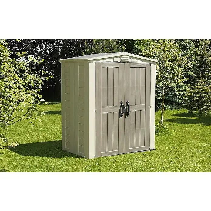 Keter Caseta de jardín Factor 6X3 - Beige/Marrón, Plástico, Área: 2,02 m² - La imagen muestra una caseta de jardín de plástico beige y gris, ideal para guardar herramientas en espacios exteriores.