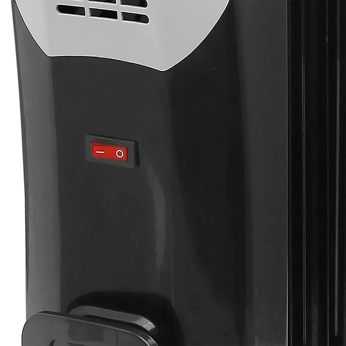 Voltomat HEATING Ölradiator - 2.000 W, Raumgröße bis ca. 25 m², Schwarz - Nahaufnahme eines schwarzen Heizkörpers mit einem roten Schalter, der sich im Aus-Zustand befindet. Perfekt für kalte Tage.