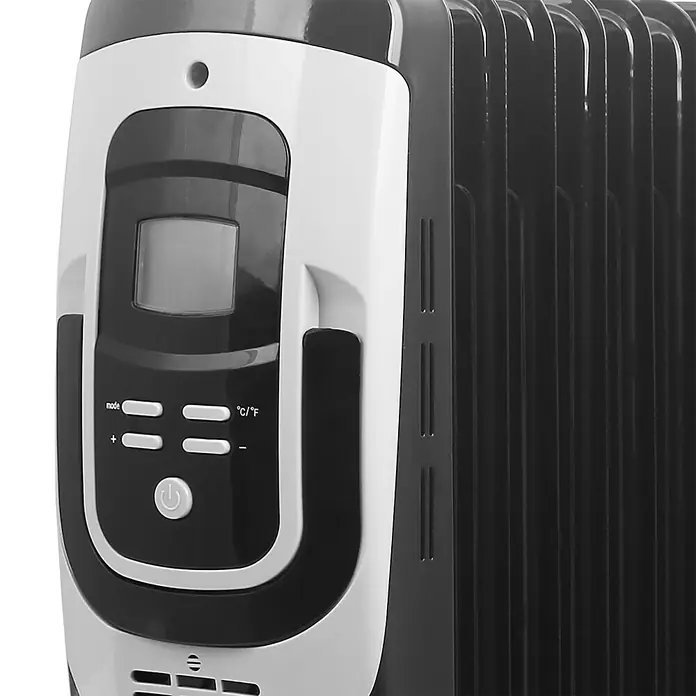 Voltomat HEATING Ölradiator - 2.000 W, Raumgröße bis ca. 25 m², Schwarz - Detailaufnahme eines Heizkörpers mit digitaler Steuerung und verschiedenen Moduseinstellungen für eine individuelle Wärmeregulierung.
