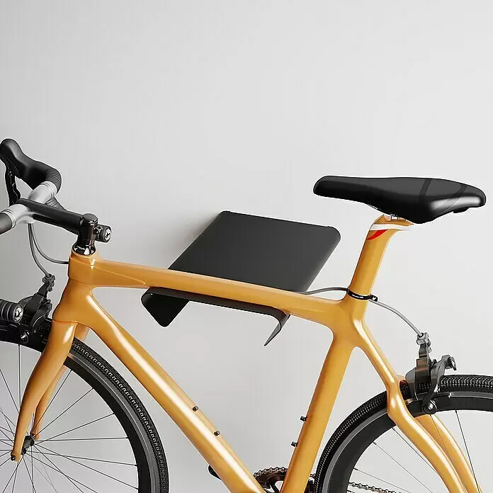 Rei Fahrradhalterung - L x B x H: 365 x 280 x 85 mm - Schwarzes Fahrradregal am orangefarbenen Fahrradrahmen befestigt.