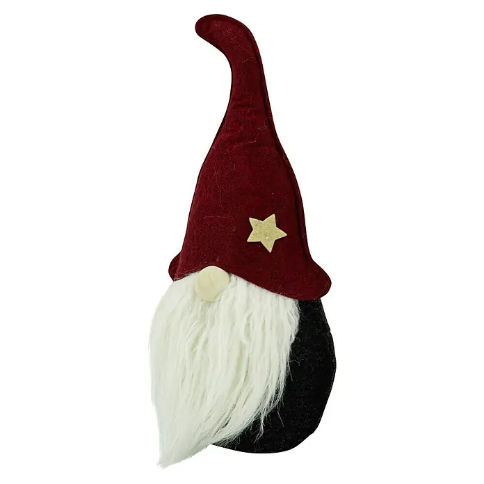 Dekofigur Wichtel mit roter Mütze und Stern - L x B x H: 13 x 9 x 35 cm, Rot - Nahaufnahme einer festlichen Gnom-Dekoration mit roter Mütze, Sternakzent und flauschigem weißem Bart, ideal für die Weihnachtsdekoration.