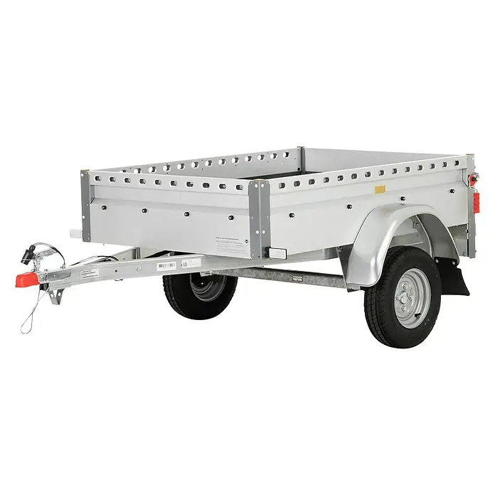 Stema Anhänger BH-R 550 - Nutzlast: 455 kg, Einachser, Kasteninnenmaß: 154 x 108 x 33 cm, Ungebremst - Abbildung eines silbernen Anhängers mit Ladefläche und zwei Rädern. Ideal für den Transport verschiedener Güter und Materialien.