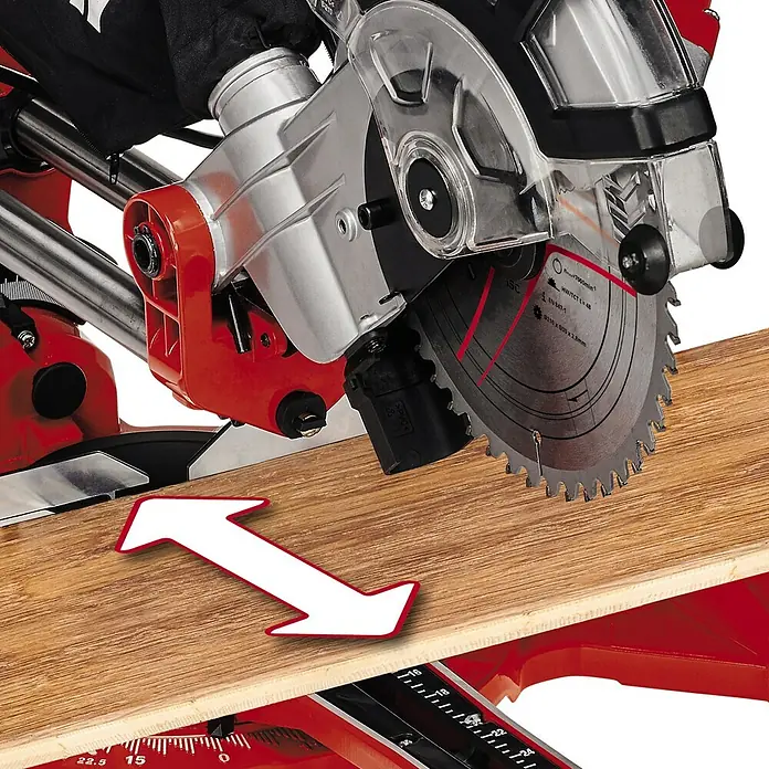 Einhell Kapp- & Gehrungssäge TC-SM 2131/1 Dual - 1.800 W, Durchmesser Sägeblatt: 210 mm, Leerlaufdrehzahl: 4.900 U/min - Die Präzision der Kreissäge im Detail, ideal für präzise Holzzuschnitte mit einer deutlichen Schnittrichtung durch den Pfeil.