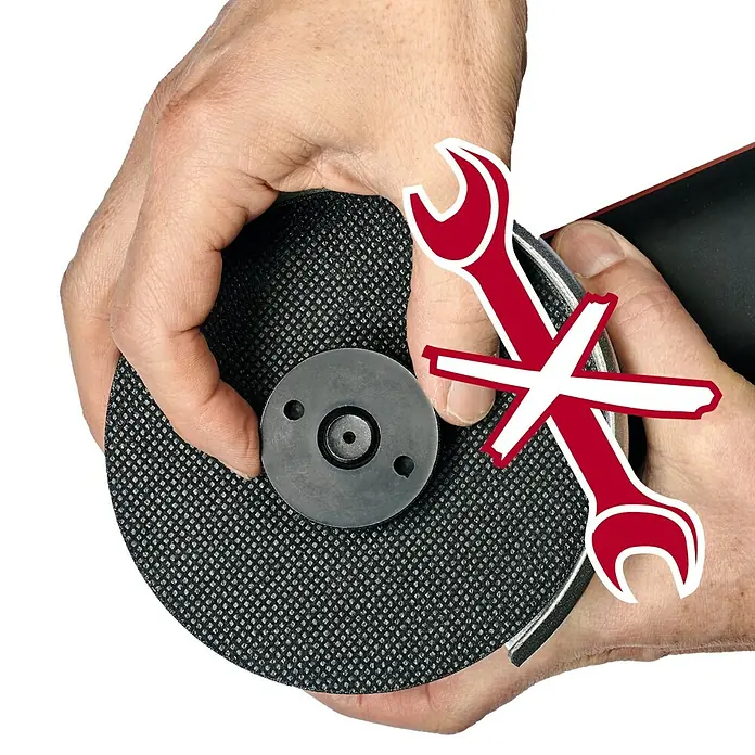 Einhell Professional PXC 18V Amoladora angular de batería Axxio 18/125 Q - Sin batería, Diámetro disco: 125 mm, 8.500 r.p.m. - La imagen muestra una mano que sostiene un disco de esmerilar. Se ve un icono de herramienta rojo con una cruz encima.