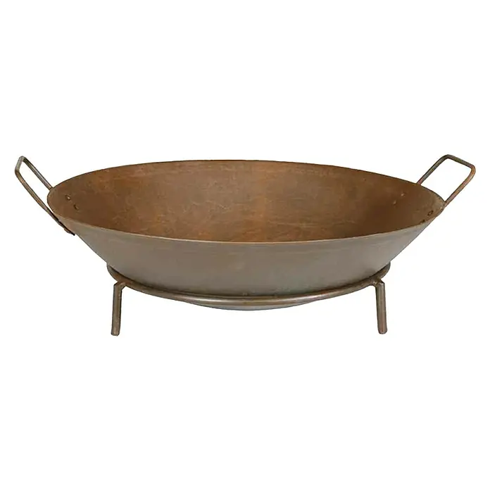 Siena Garden Feuerschale Rusty - Durchmesser: 48 cm, Gusseisen - Bild einer Kupfer Feuerstelle mit Griffen und einem dazugehörigen Untergestell, ideal für Wärme im Freien.