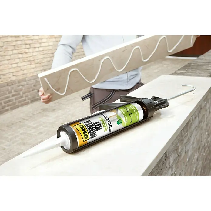 UHU Adhesivo para montaje Montakit Ultimate - 440 g, Cartucho - Kit de montaje UHU para todos los trabajos, ideal para fijar componentes. Adhesivo aplicándose en línea ondulada a una pieza.