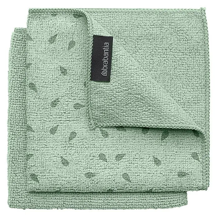 Brabantia Paños de cocina Limpiaplatos de microfibra - Material: Materiales naturales, 2 ud. - Un paño de microfibra verde claro con un patrón sutil y una etiqueta negra de 'Brabantia', ideal para la limpieza del hogar.