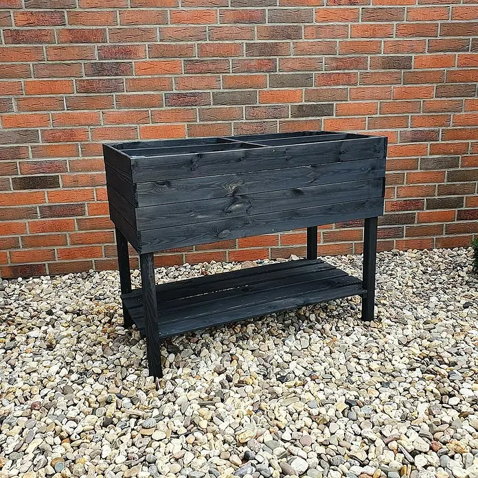 Promadino Hochbeet - 100 x 50 x 80 cm, Holz, Anthrazit - Hier ist ein stilvolles, erhöhtes Pflanzgefäß aus dunklem Holz mit Ablagefläche, perfekt für Gartenliebhaber.