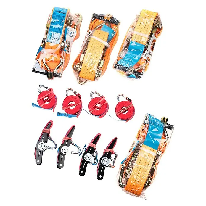 Stema Ladungssicherungs-Set bis LC 2000 daN - 23 -tlg. - Abbildung von Spanngurten, Seilwinden und einem Drahtseilzug, alle sorgfältig in Plastik verpackt, für sicheren Transport und Lagerung.
