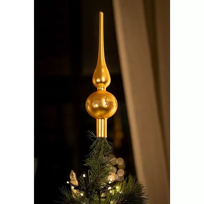 Christbaumspitze - Glas, Gold - Goldene Weihnachtsbaumspitze mit Glitzerrentieren auf einem beleuchteten Kunstbaum.
