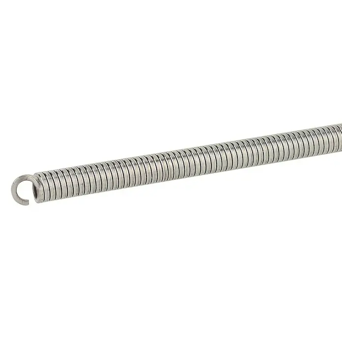 Comisa Innen-Biegefeder - Passend für: Verbundrohre 20 mm - Nahaufnahme einer Zugfeder aus Metall, die sich vor einem hellen Hintergrund erstreckt und ihre Spiralstruktur und Funktionalität zeigt.