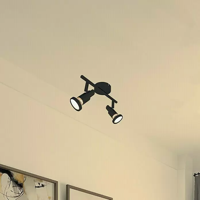 Tween Light LED-Deckenstrahler - 8 W, L x B x H: 27,5 x 14,6 x 8 cm, Schwarz-matt, Warmweiß, 2 Stk. - Schwarze zweiflammige Deckenleuchte mit verstellbaren Strahlern, an cremefarbener Decke über Kunstwerk montiert.