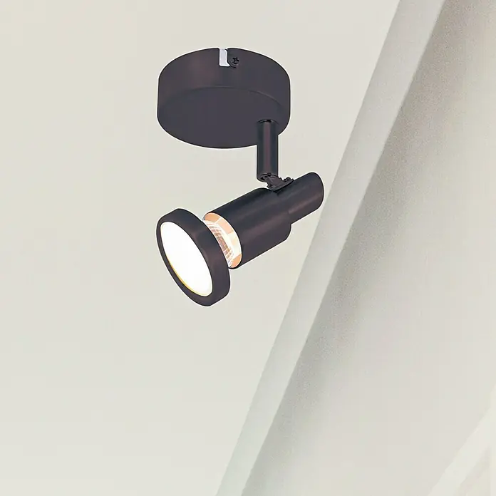 Tween Light LED-Deckenstrahler - 4 W, L x B x H: 13 x 8 x 8 cm, Schwarz-matt, Warmweiß, 1 Stk. - Nahaufnahme einer modernen, dunklen Deckenleuchte, die Licht in einem minimalistischen Raum spendet.