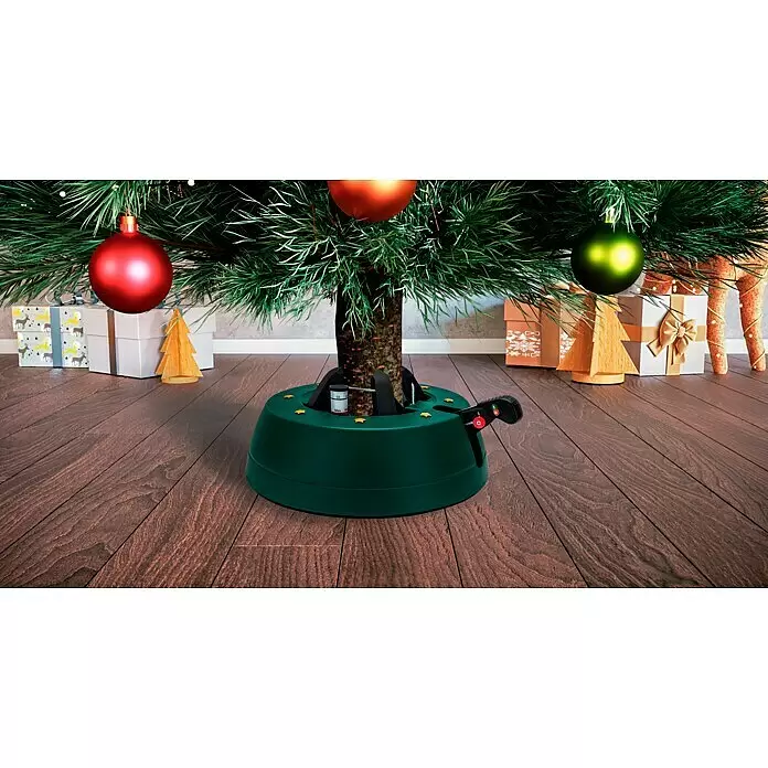 Christbaumständer Start 2 - 34 x 10,5 cm, Kunststoff, Rund, Max_Baumlaenge: 2,5 Meter (m) - Dunkelgrüner Weihnachtsbaumständer mit Wasserreservoir und Fußpedalmechanismus, hält den Stamm eines geschmückten Weihnachtsbaums.