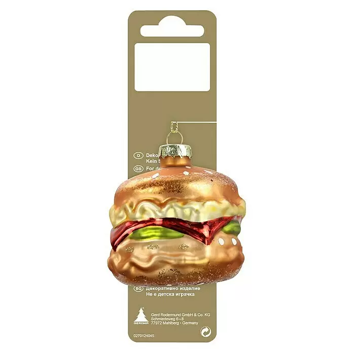 Dekoartikel - Bunt, Glas, Hamburger, 6,5 cm - Gläserner Hamburger-Weihnachtsanhänger auf Verpackung, als Dekoartikel gekennzeichnet.