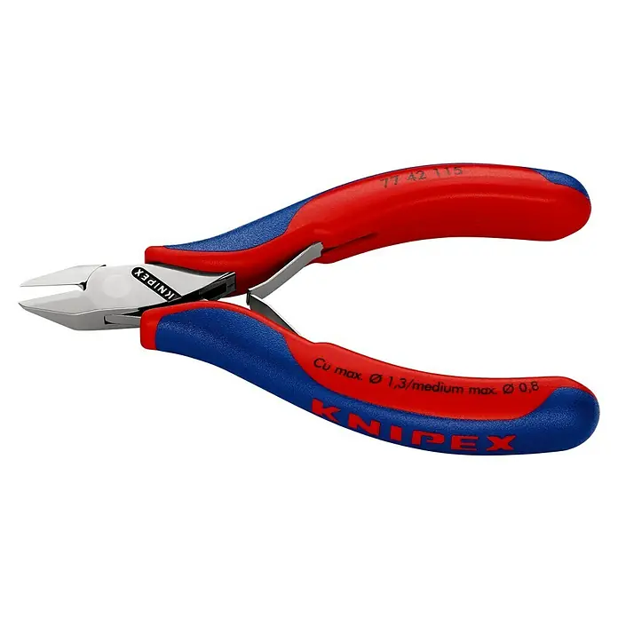 Knipex SeitenschneiderLänge: 11,5 cm, Härte Schneide: 57 HRC, Ölgehärtet, 0,3 mm - 1,3 mm - Nahaufnahme einer Knipex 77 42 115 Elektronik-Seitenschneider, die für präzise Schneidarbeiten in der Elektronik entwickelt wurde.