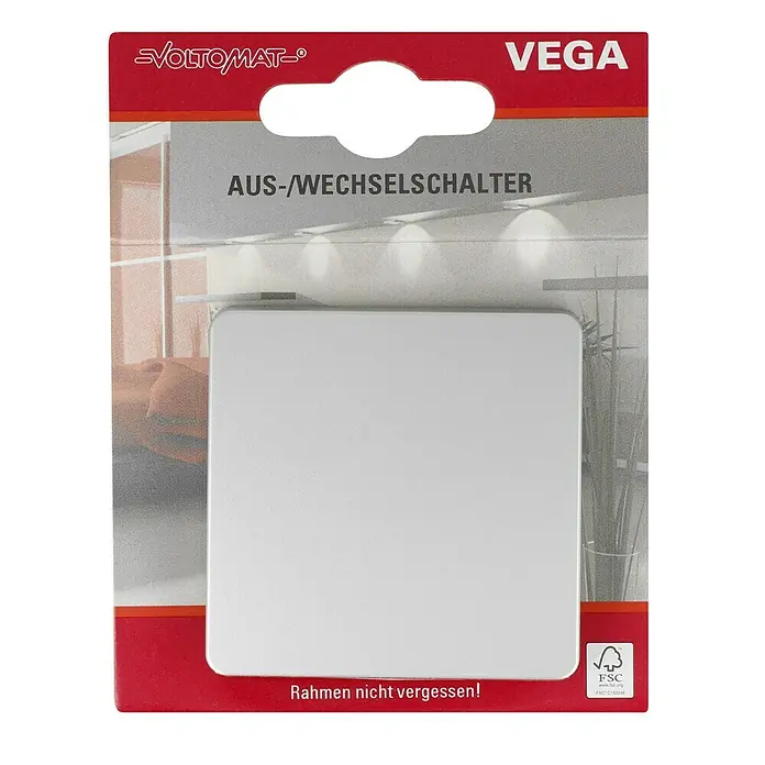 Voltomat VEGA Wechselschalter - Silber, Glänzend, Unterputzmontage, 10 A - Bild einer VEGA Aus-/Wechselschalter Verpackung von VOLTOMAT. Beachten Sie den Hinweis "Rahmen nicht vergessen!" auf der Verpackung.