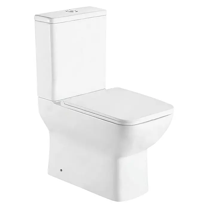 Pack WC de pie sin borde Porto - Sin borde de descarga, Salida dual, Blanco - Primer plano de un inodoro blanco con tapa y cisterna cerradas sobre un fondo negro.